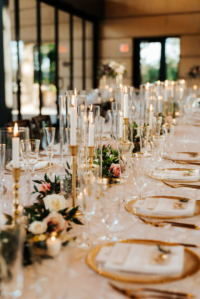 Elegant Taper Candles, White Linens, and Gold Accents
