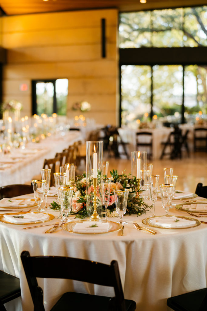 Low Pink Centerpieces, Elegant Taper Candles, and Gold Accents