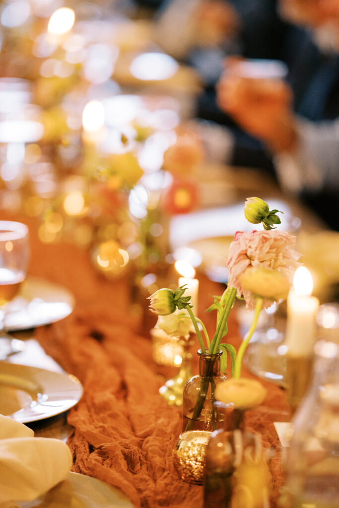 Centerpiece details at an autumn inspired boho wedding in Hutto, TX with Butterscotch details