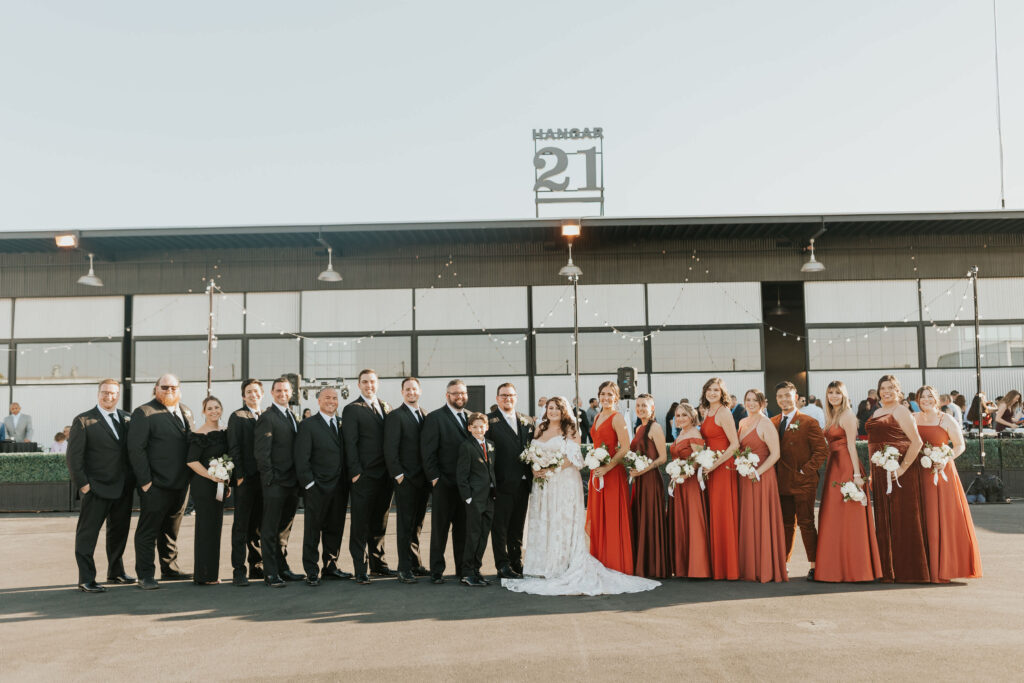 Wedding-party-group-photo-hangar21-wedding