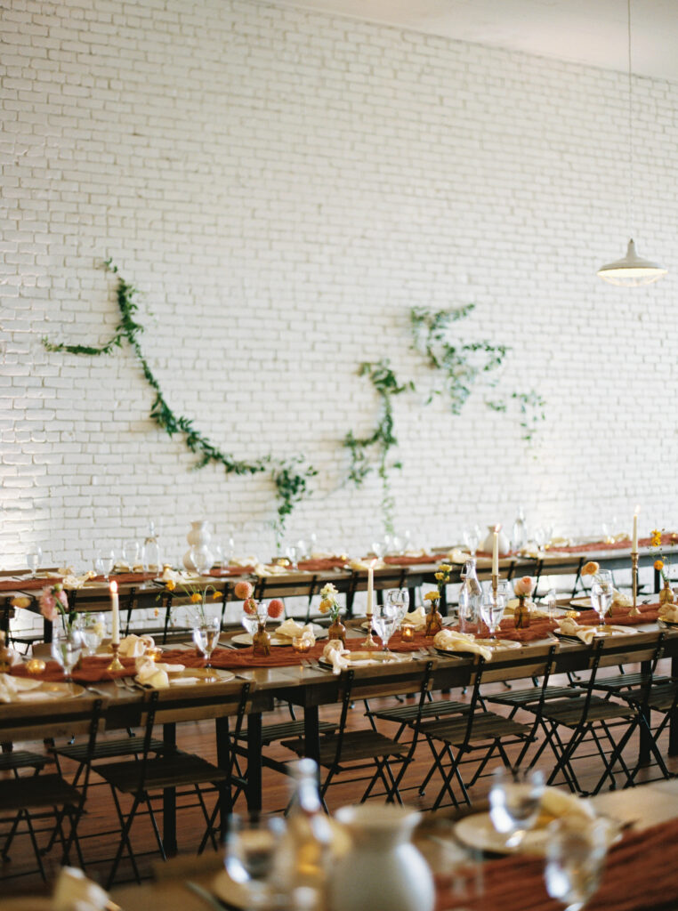 Reception setup at an autumn inspired boho wedding in Hutto, TX with Butterscotch Details